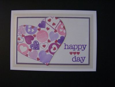 happy (heart) day
This was a fun card to make. Using a heart stencil, I filled in the center with all different stamped hearts in several different colors, cut it out & placed it on a layered background, then stamped the sentiment. LOVE this latest set of stamps!
