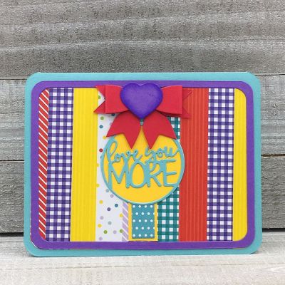 Love You More
Sizzix Card, Rounded Corners w/ Circle Drop-ins, Small Bow Die, Heart Die, TSOL papers
