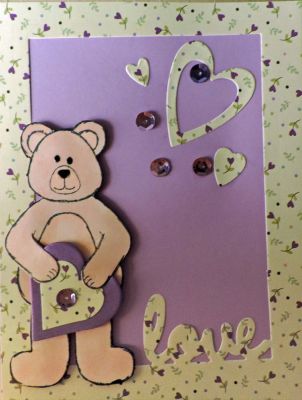 Love Bears
This is such a great stamp/die set.  I love the way that the arms can hold something.  Eyes and nose were enhanced with Glossy Accents.  
Keywords: bear Valentine